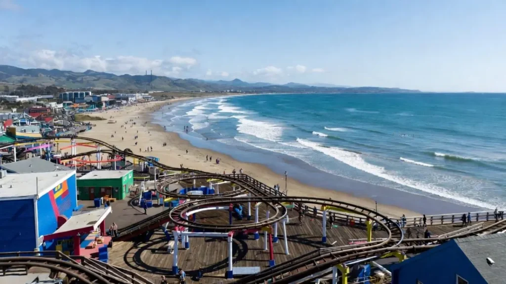 Santa Cruz California spring break destination featuring the historic Santa Cruz Beach Boardwalk with Giant Dipper roller coaster, Monterey Bay ocean views